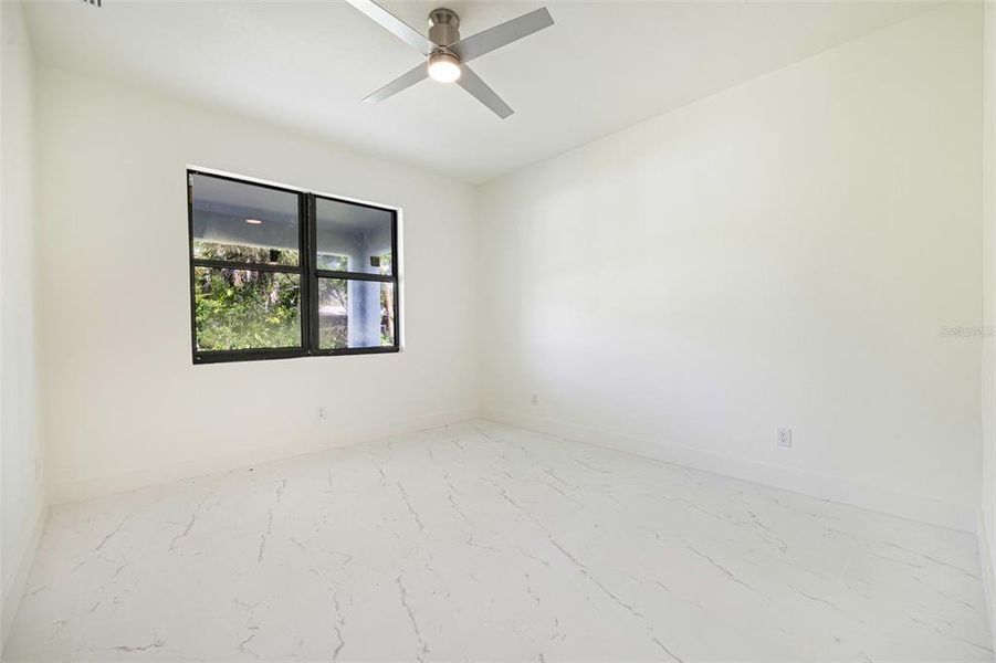 Spacious, unfurnished interior of a new home in , Port Charlotte (Image 31).