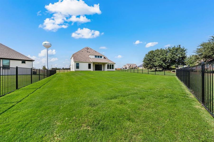 Exterior details and patio area of a home in Highland Oaks, Boyd (Image 17). Exterior details and patio area of a home in Highland Oaks, Boyd (Image 17).
