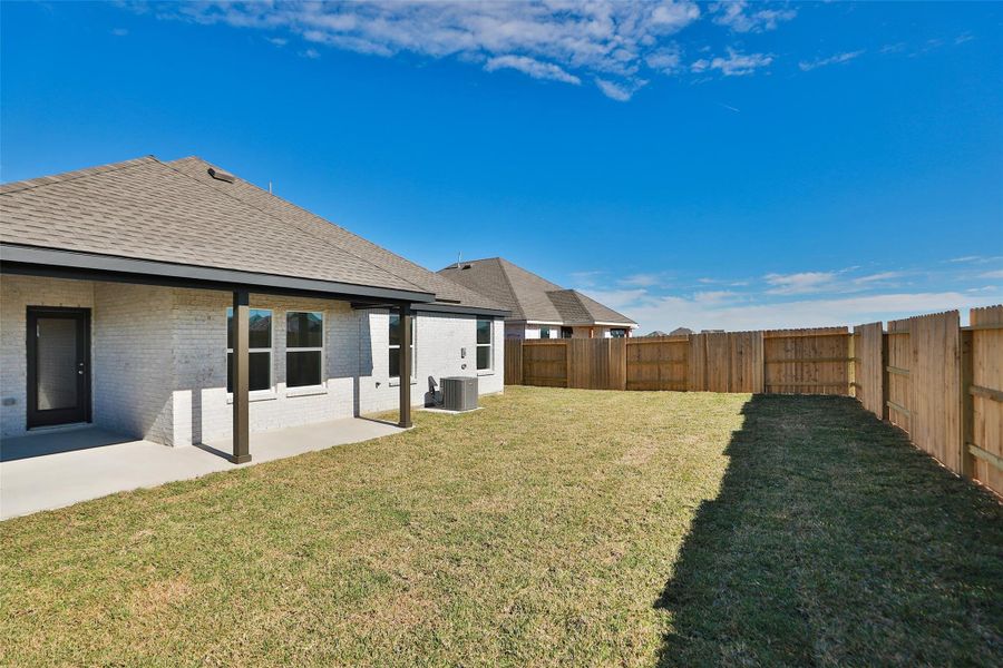 Exterior details and patio area of a home in River Ranch, Dayton (Image 20).