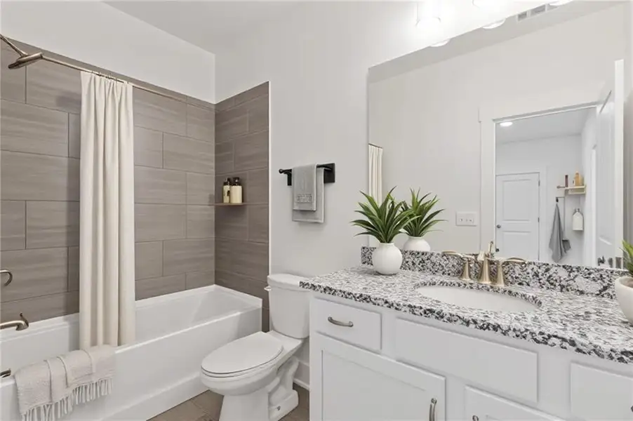 Furnished interior view inside a new home in Traditions of Braselton, Jefferson (Image 5).