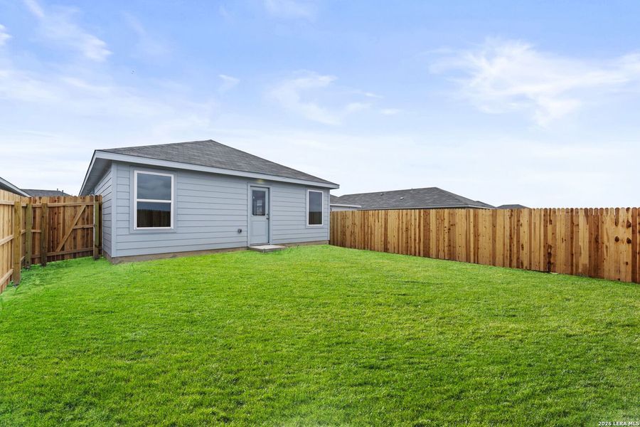 Exterior details and patio area of a home in Spring Grove, St. Hedwig (Image 2).