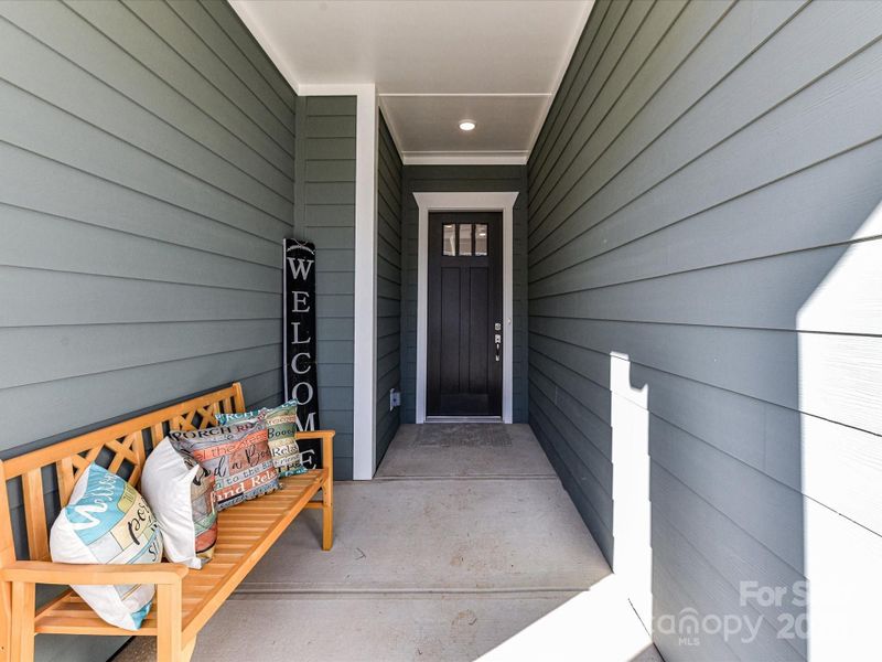 Exterior details and patio area of a home in Encore at Streamside - Tradition Series, Waxhaw (Image 33).