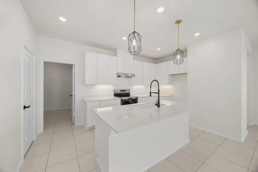 Furnished interior view inside a new home in Mustang Valley, Manor (Image 4).