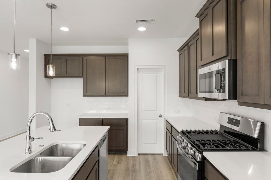 Furnished interior view inside a new home in Creekside, Royse City (Image 8).