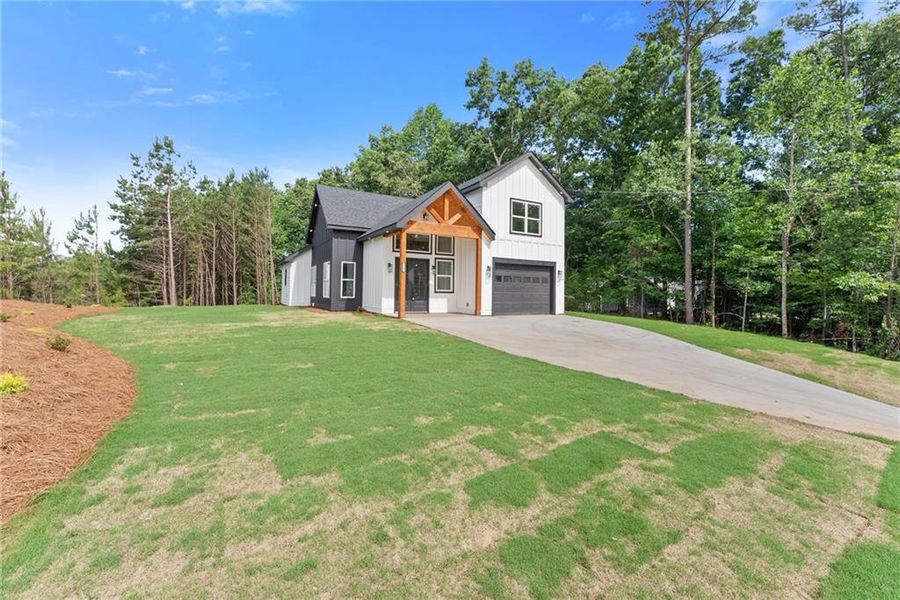 Front exterior of a new home in , Buford, GA, highlighting curb appeal (Image 21).