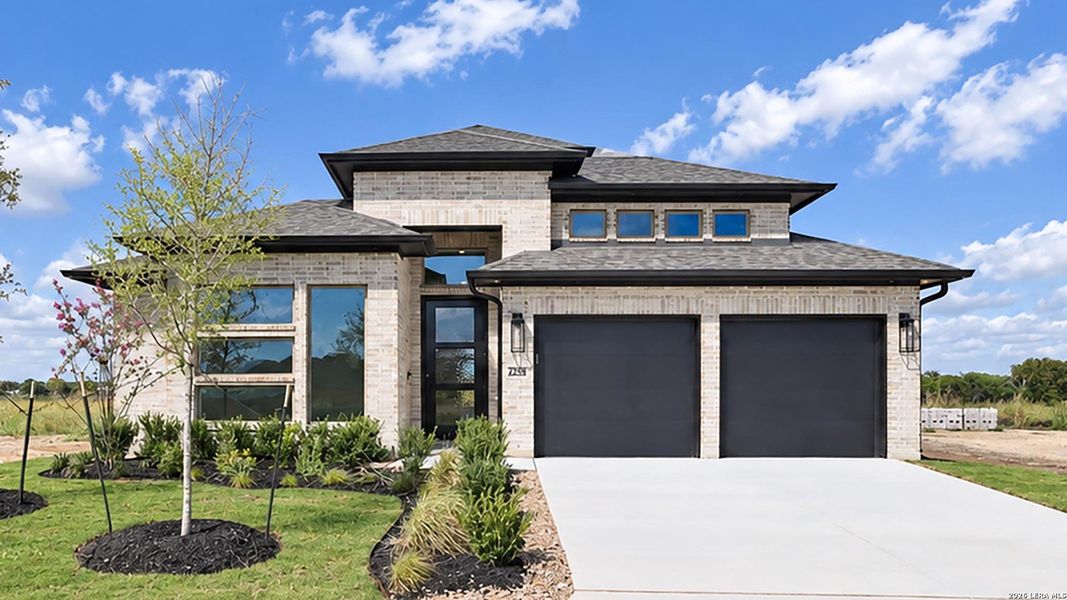 Front exterior of a new home in Legacy at Lake Dunlap, New Braunfels, TX, highlighting curb appeal (Image 21).