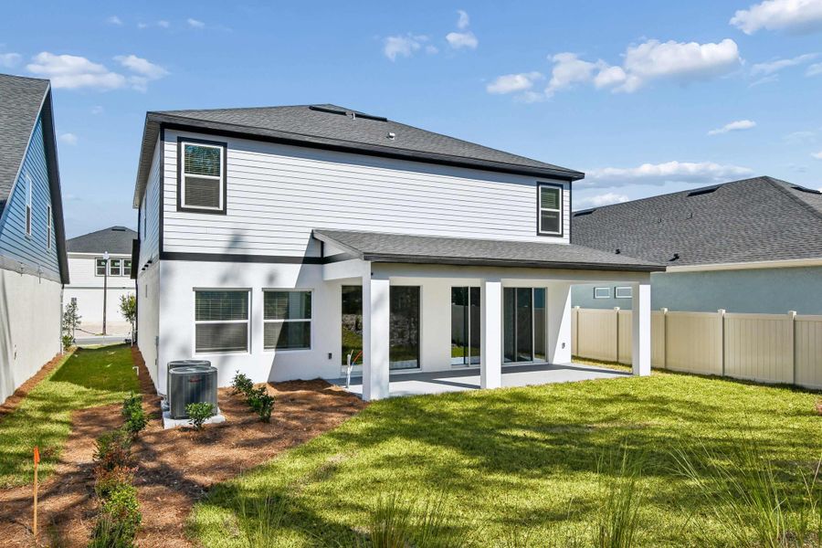 Representative exterior details of a home built from the The Bradley by David Weekley Homes in Palmeras at Crossprairie – The Grove Collection, St. Cloud (Image 4).