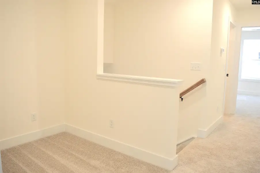 Spacious, unfurnished interior of a new home in Bickley Station, Irmo (Image 24).
