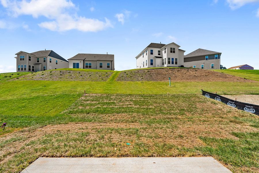 Front exterior of a new home in Hanes Lake, Winston-Salem, NC, highlighting curb appeal (Image 24). Front exterior of a new home in Hanes Lake, Winston-Salem, NC, highlighting curb appeal (Image 24).