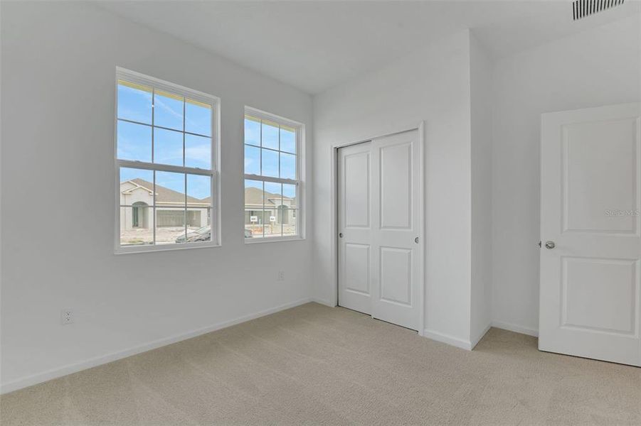 Spacious, unfurnished interior of a new home in Annabelle Estates, Winter Haven (Image 29).