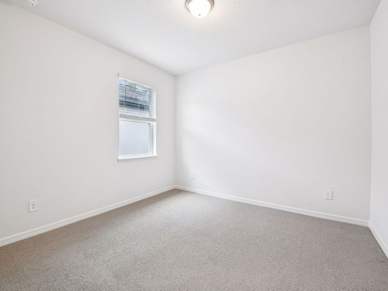 Spacious, unfurnished interior of a new home in Ridgehaven - Signature Series, Ormond Beach (Image 13).