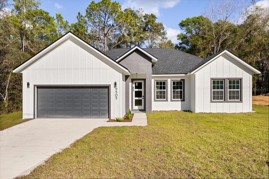 Front exterior of a new home in , Citrus Springs, FL, highlighting curb appeal (Image 19). Front exterior of a new home in , Citrus Springs, FL, highlighting curb appeal (Image 19).