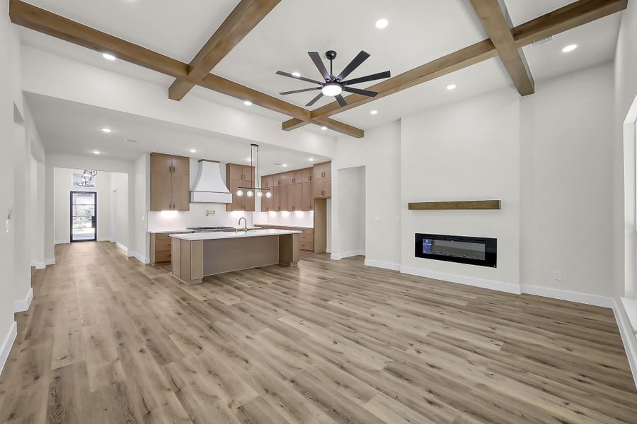 The bright and airy open kitchen and living area lends itself to cozy gatherings with family and friends.