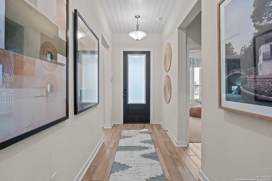 Furnished interior view inside a new home in The Crossvine – Garden Homes, Schertz (Image 13).