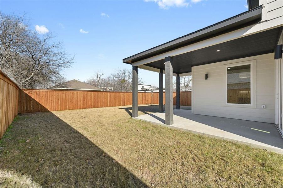 View of yard with a patio