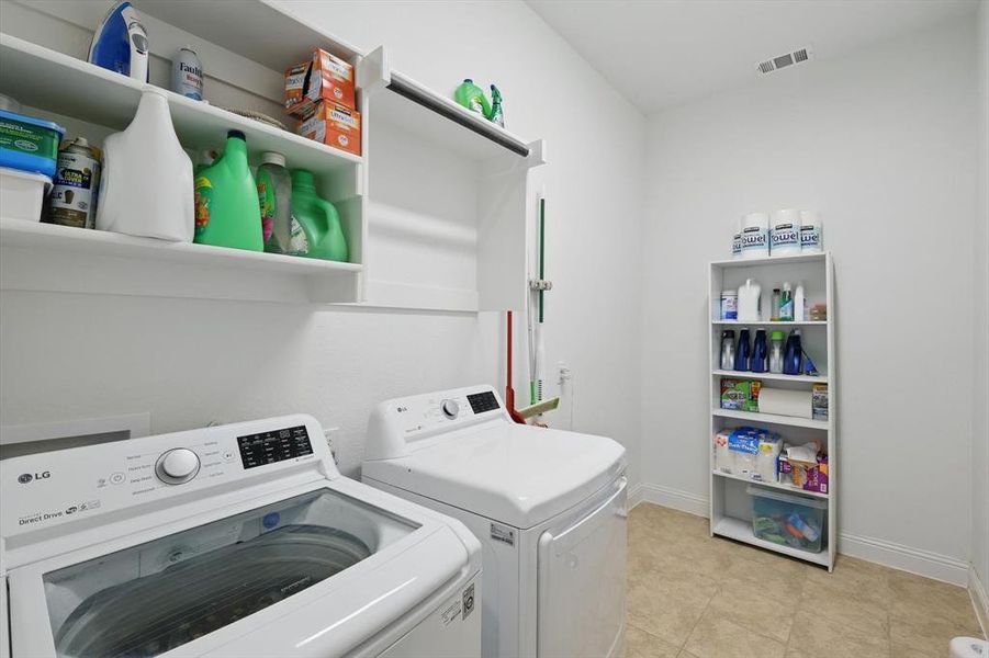 The Laundry Room is large enough for a freezer and additional storage.