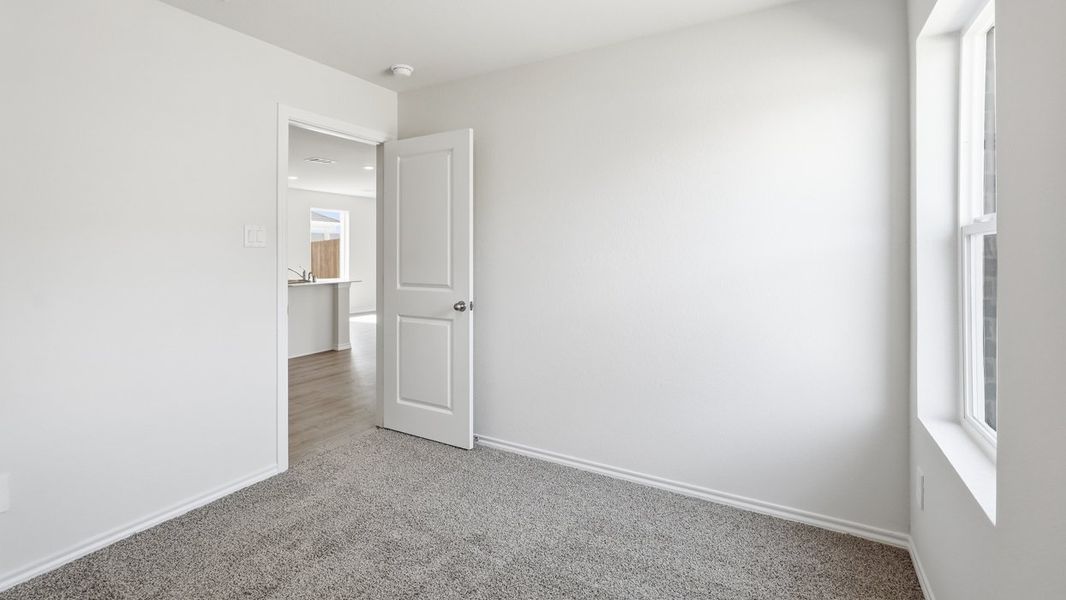 Representative unfurnished interior of a home built from the Barton by D.R. Horton in Leonard Crossing, Leonard (Image 15).