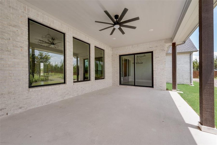 View of patio with ceiling fan