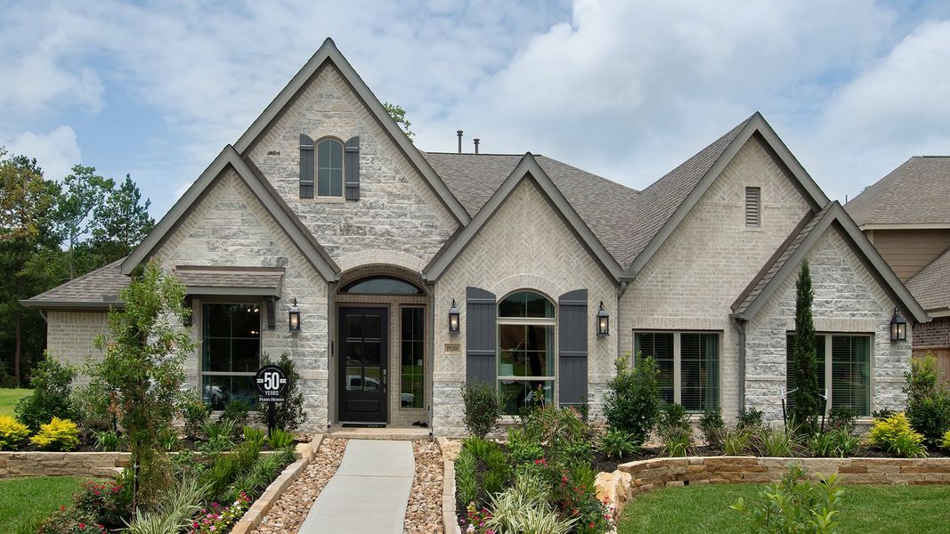 Front exterior of a new home in Jordan Ranch, Fulshear, TX, highlighting curb appeal (Image 15).