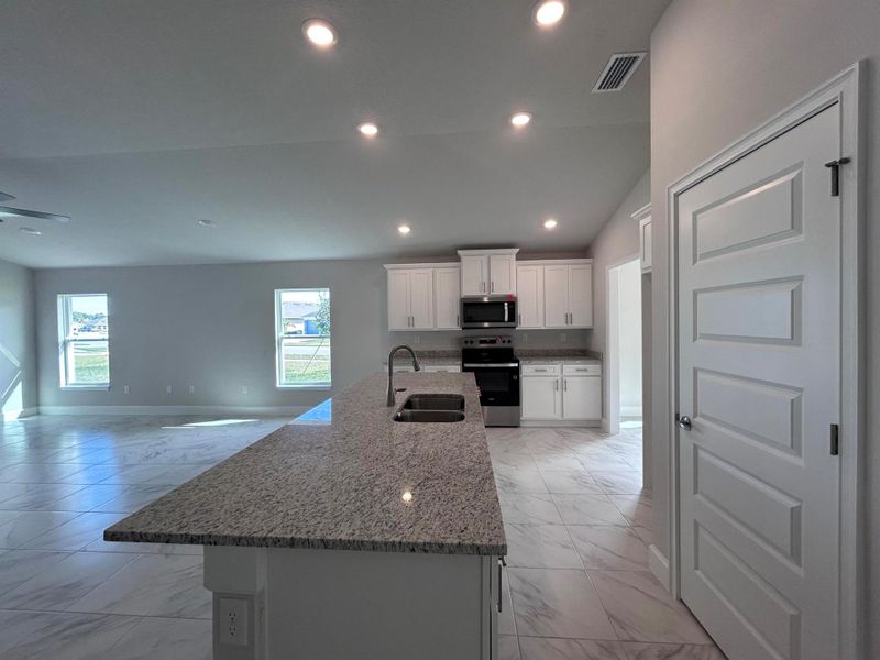 Furnished interior view inside a new home in Waterstone 72, Fort Pierce (Image 8). Furnished interior view inside a new home in Waterstone 72, Fort Pierce (Image 8).