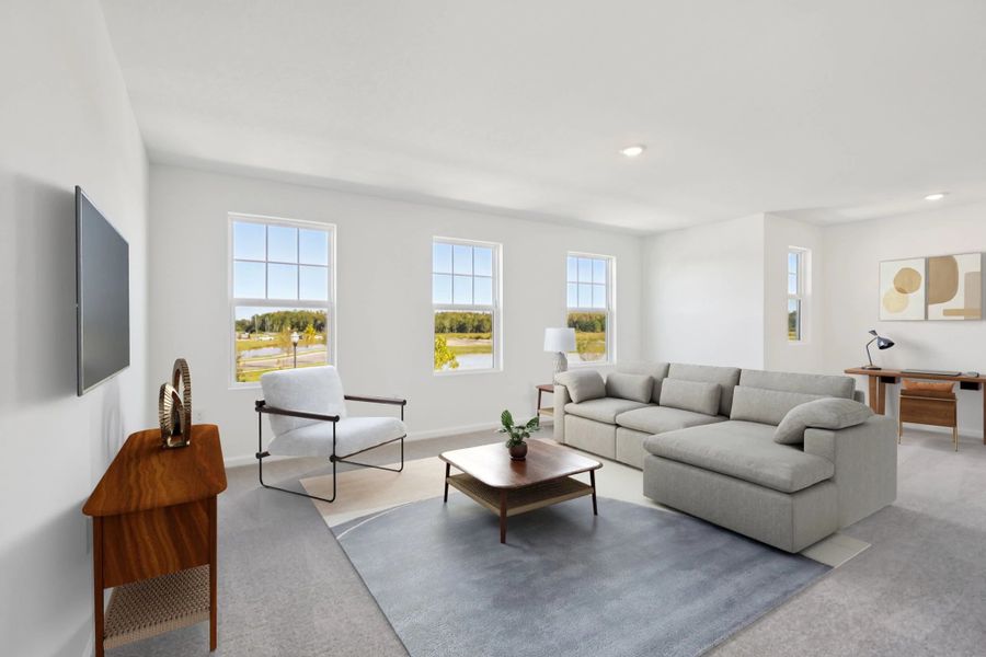 Representative furnished interior of a home built from the Keele by Starlight Homes in Hawks Run, Kissimmee (Image 8).