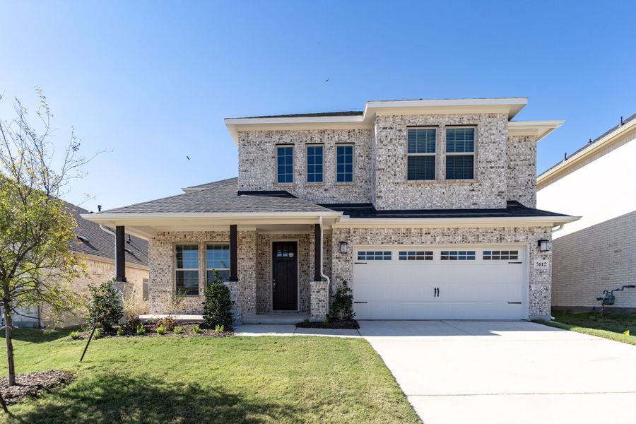 Front exterior of a new home in Westridge, McKinney, TX, highlighting curb appeal (Image 1). Front exterior of a new home in Westridge, McKinney, TX, highlighting curb appeal (Image 1).