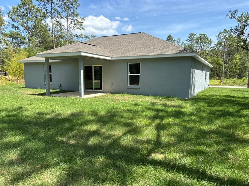 Exterior details and patio area of a home in , Dunnellon (Image 16).