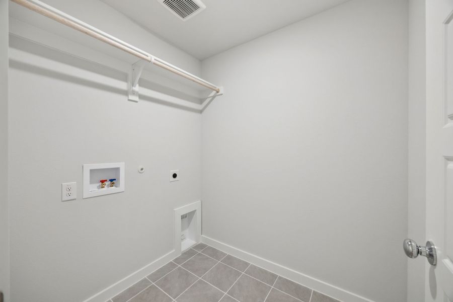 Utility Room in the Hadley home plan by Trophy Signature Homes – REPRESENTATIVE PHOTO