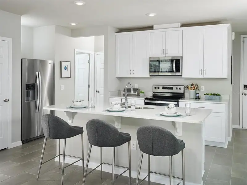 Furnished interior view inside a new home in The Meadow at Crossprairie Townes, St. Cloud (Image 6).