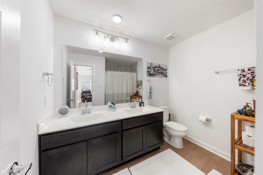 Furnished interior view inside a new home in Pinewood at Grand Texas, New Caney (Image 8).