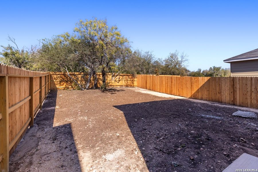 Exterior details and patio area of a home in Spanish Trails Villas, San Antonio (Image 3).