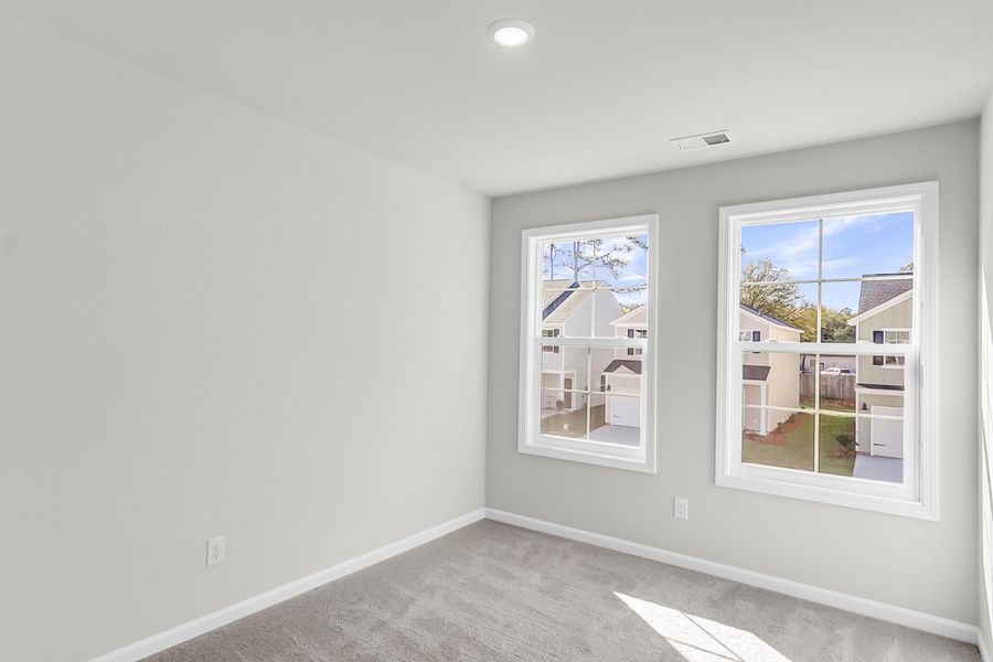 Spacious, unfurnished interior of a new home in Central Creek, Goose Creek (Image 39).