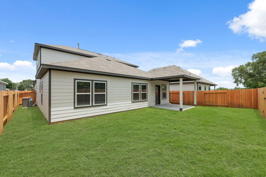 Exterior details and patio area of a home in Russell Ranch, Bay City (Image 4).