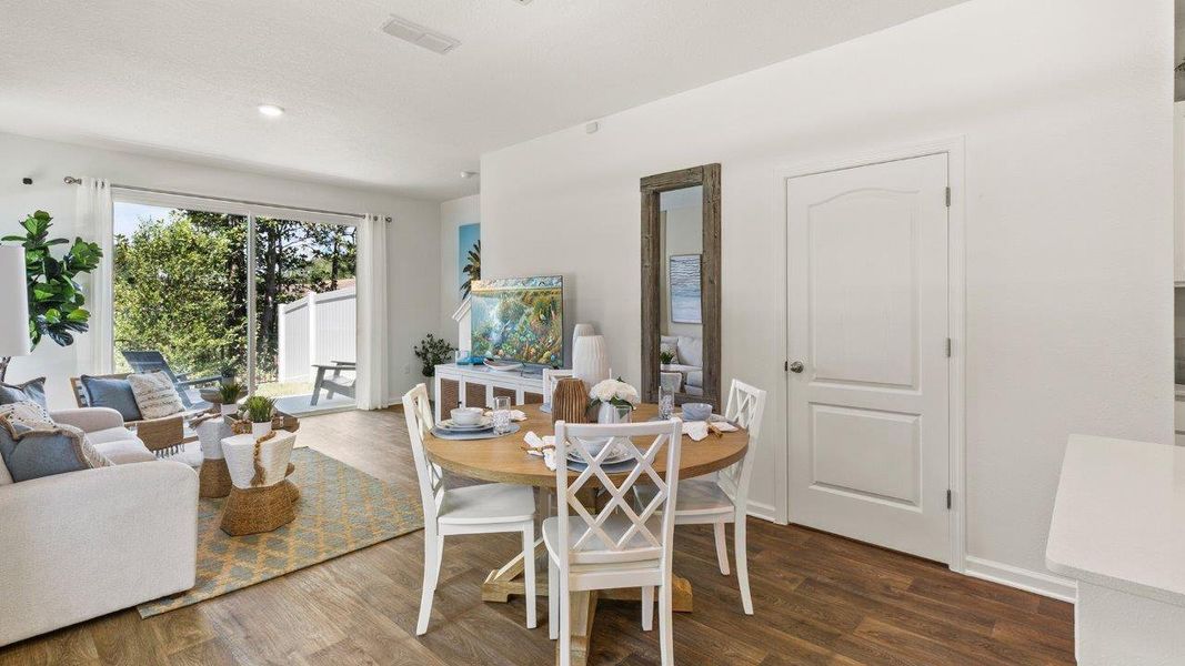 Representative furnished interior of a home built from the GREYSON by D.R. Horton in Hansen Creek, Jacksonville (Image 6).
