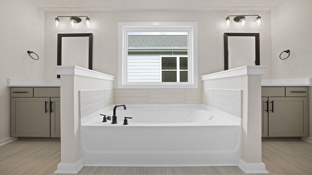 Representative furnished interior of a home built from the BERKSHIRE by D.R. Horton in Sycamore Cove, Woodruff (Image 11).