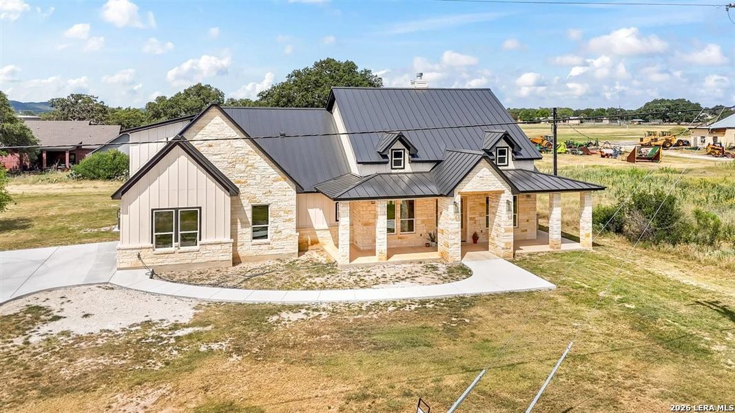 Front exterior of a new home in , Bandera, TX, highlighting curb appeal (Image 27). Front exterior of a new home in , Bandera, TX, highlighting curb appeal (Image 27).
