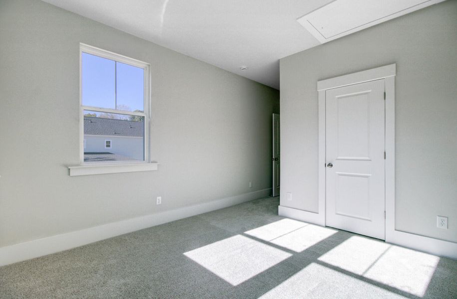 Spacious, unfurnished interior of a new home in Indigo Grove Single Family Homes, Johns Island (Image 45).