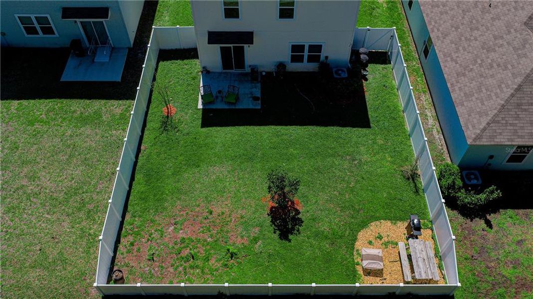 Exterior details and patio area of a home in Sawmill Branch Express, Palm Coast (Image 26).