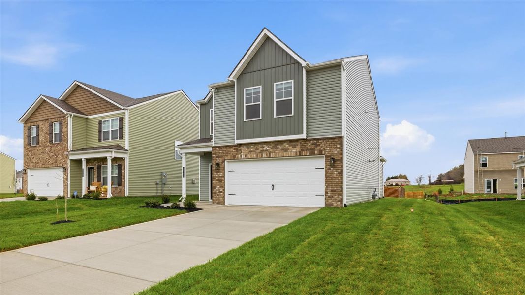 Front exterior of a new home in Best Farms, Maryville, TN, highlighting curb appeal (Image 24). Front exterior of a new home in Best Farms, Maryville, TN, highlighting curb appeal (Image 24).