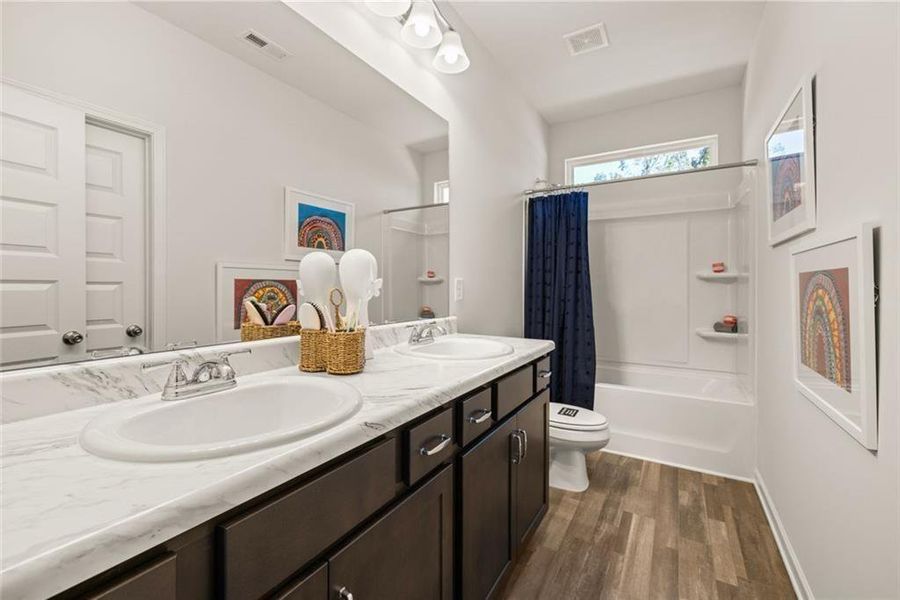 Furnished interior view inside a new home in Summerfield Place, Carrollton (Image 52). Furnished interior view inside a new home in Summerfield Place, Carrollton (Image 52).