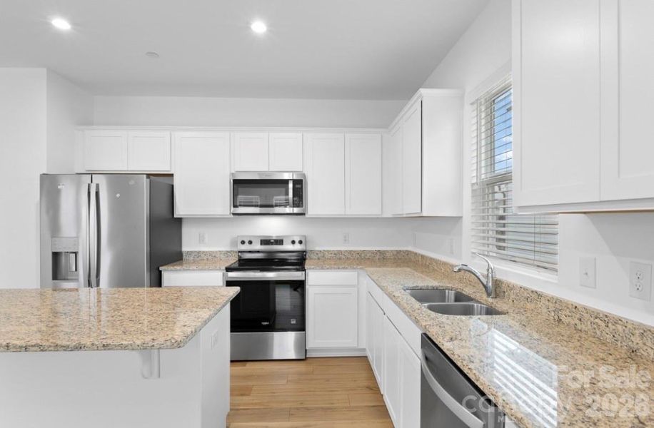 Furnished interior view inside a new home in Spring Meadow, Concord (Image 10).