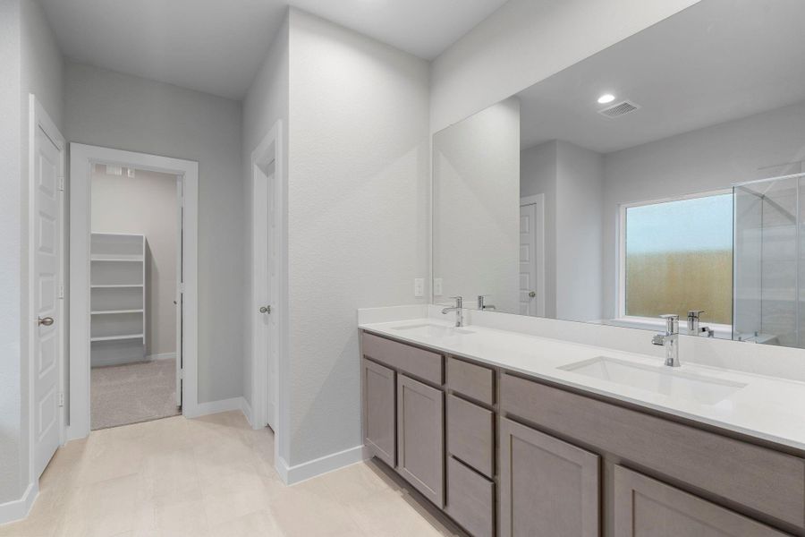 Furnished interior view inside a new home in Barton Creek Ranch, Conroe (Image 6).