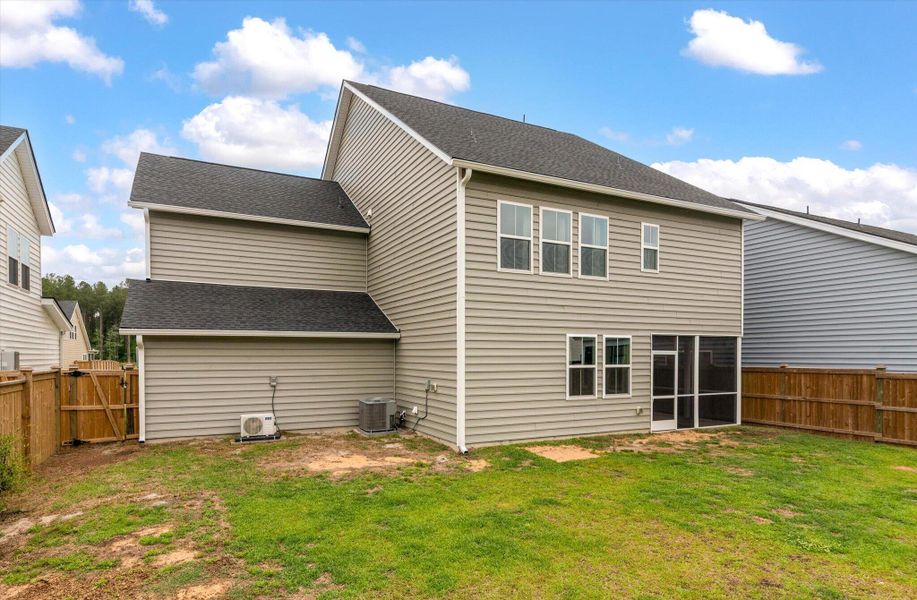 Exterior details and patio area of a home in Sweetgrass at Summers Corner, Summerville (Image 28).