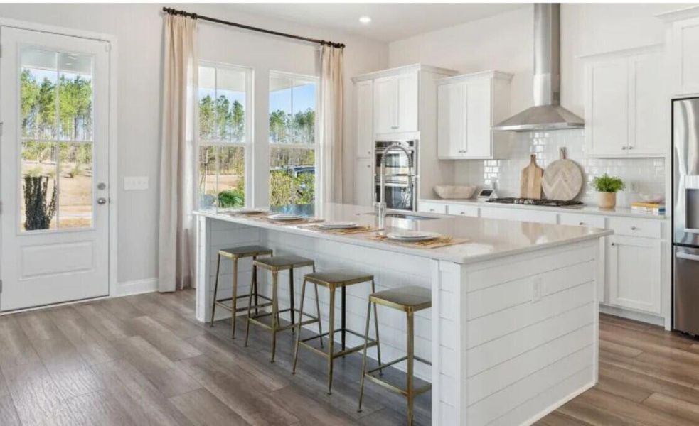 Furnished interior view inside a new home in Sweetgrass at Summers Corner, Summerville (Image 5).
