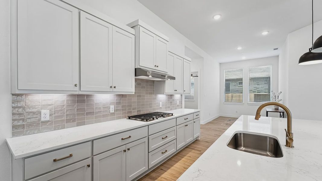 Representative furnished interior of a home built from the Cayman by Chesmar Homes in Crescent Bluff, Georgetown (Image 9).