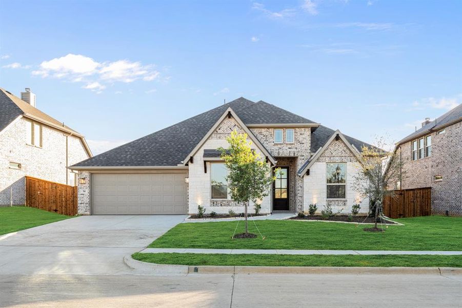 Front exterior of a new home in Mockingbird Hills 60-65, Joshua, TX, highlighting curb appeal (Image 26).