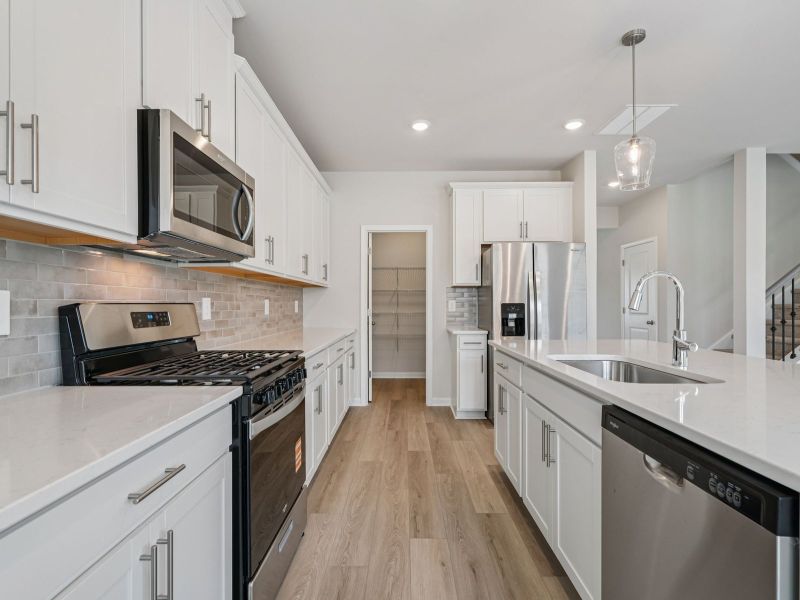 Furnished interior view inside a new home in Northwoods at Mirror Lake, Villa Rica (Image 7).