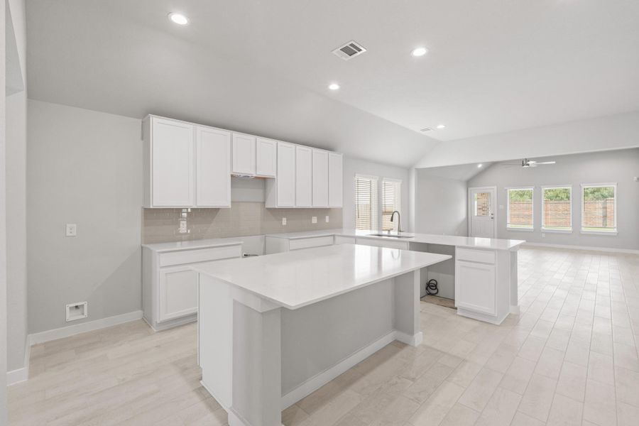 Furnished interior view inside a new home in Sunterra North, Katy (Image 6).