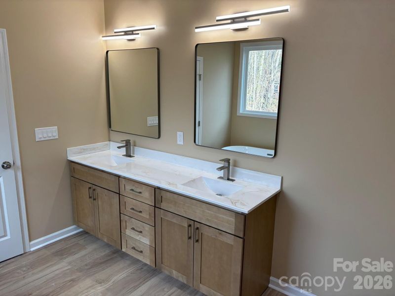 And a dual vanity w/individual mirrors and lighting.
