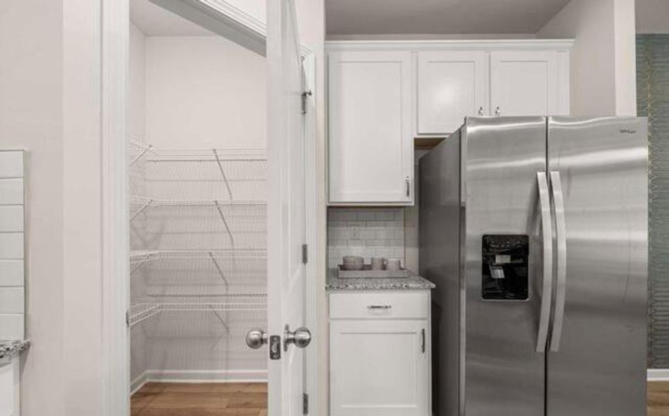 Furnished interior view inside a new home in Walden Park - The Retreat, Jonesboro (Image 9).